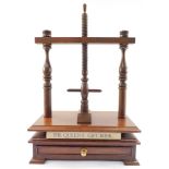 A Georgian style mahogany book press, with single frieze drawer, raised on bracket feet, 58cm high,