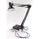 A weighted plastic and metal anglepoise lamp, 80cm high.