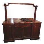 A Victorian figured mahogany mirror back sideboard, the top with a leaf and scroll carved crest, abo