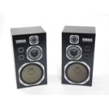 A pair of Yamaha NS-100 monitor speakers, 68cm high, 38cm wide.
