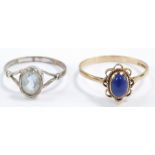 A 9ct gold and blue cabochon hard stone ring, size S, together with a 9ct white gold and aquamarine