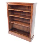 A late Victorian walnut open bookcase, the top with a moulded edge above three adjustable shelves, o