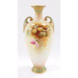 A Royal Worcester porcelain twin handled vase, painted with roses, on a blush ivory ground, printed