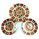 Three Royal Crown Derby Old Imari pattern cabinet plates, comprising two small 1128 pattern