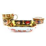Three Royal Crown Derby Imari porcelain items, comprising a demi-tasse coffee can, hexagonal box and