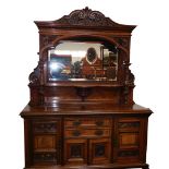 A late 19thC/ early 20thC oak and burr oak sideboard, the raised back with an egg and dart moulded c