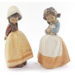 Two Lladro figures modelled as children, 21cm high.