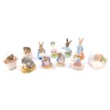 A selection of Beatrix Potter figures by Royal Albert, including Peter Rabbit, Mrs Rabbit and Bunnie