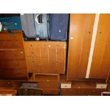 Mid 20thC oak veneered bedroom furniture, to include wardrobes, chests, dressing tables, etc. (8)