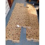 Three Wilton 1950's machine made runners, each with beige ground and repeating floral design, two me