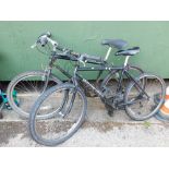 Two Edinburgh Bicycle branded mountain type bikes, with grip shift group sets.