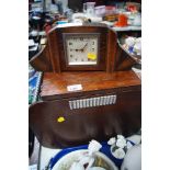 An early 20thC oak coal box, and an Art Deco style oak cased mantel clock, with Arabic numeric dial.