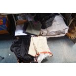 Clothing, to include men's shirts, jumpers, etc. (contents of under one table)