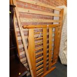 A king size pine bed frame.