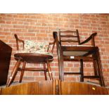 An Ercol cow horn armchair, together with an Ercol dining chair. (2)