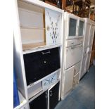 Two 1950's kitchen larder cupboards, together with a painted oak cupboard. (3)