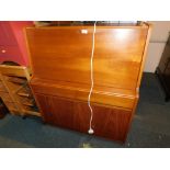 A teak bureau.