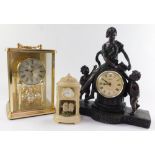 A Kundo anniversary type carriage clock, figural clock and a small owl house clock. (3)