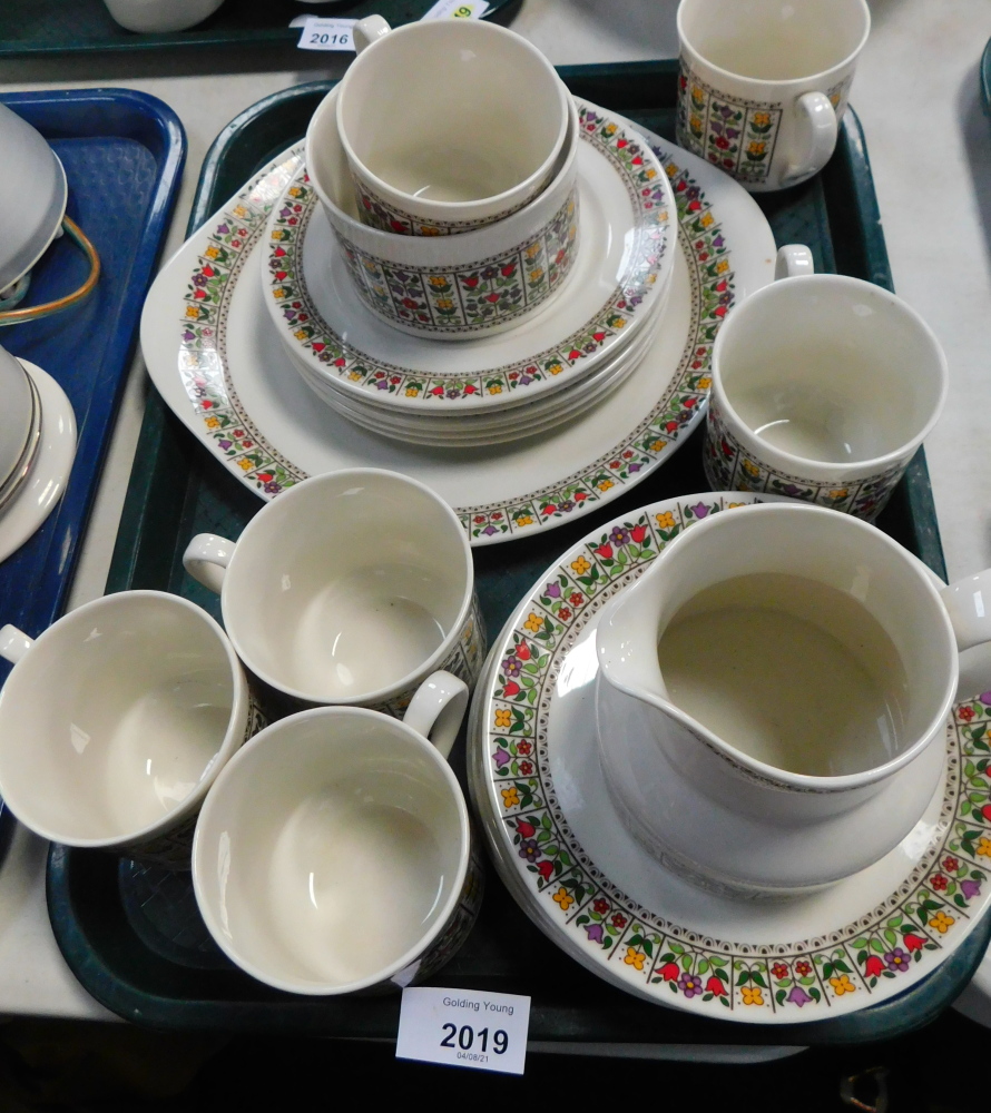 A Royal Doulton porcelain part tea service decorated in the Fireglow pattern, comprising bread plate