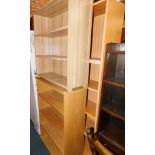 A beech effect bookcase, together with two oak effect bookcases. (3)