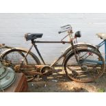 A mid 20thC gentleman's bicycle, with gear group set, mud guards, etc.