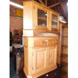 A pine side cupboard, together with a pine television stand. (2)