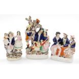 A group of 19thC Staffordshire flat back figures, to include The Revival Old Long Tine and another,