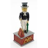 A reproduction Uncle Sam metal money box, 28.5cm high.