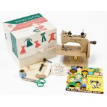 A Singer Sew Handy child's sewing machine, boxed.