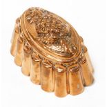 A Victorian copper jelly mould, of oval design with embossed pineapple top, makers stamp and numbere