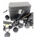 A Pentax Asahi Spot Matic camera, with a super multi coated Takumar 1-1.4/50 lens, a Ina 135mm lens,