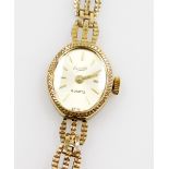 A 9ct gold Everite ladies wristwatch, with small oval watch head on three bar bracelet, 9.8g all in.