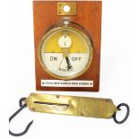 A wall mounted gauge for The Goods In dependant from Ponton, and a Salters improved spring balance n