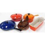 A group of Le Creuset and other pans, to include an orange Le Creuset milk pan and cover, a red enam