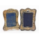 An Edwardian silver photograph frame, with repousse cherub and foliate scroll decoration, Birmingham