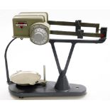 A Torbal torsion balance model ST1, designed for college labs to achieve accurate weighing, on a gre