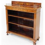 An Edwardian walnut open bookcase, with marquetry inlay of dragons, scrolls and flowers, with a top