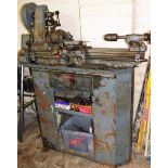 A Myford lathe and stand, together with various cutting tools. Buyer Note: WARNING! This lot contai