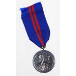 A George V Coronation medal 1911, with ribbon.