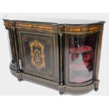 A Victorian ebonised credenza, with gilt metal mounts, the panelled door inlaid in burr walnut with