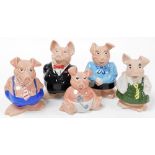 A group of Wade NatWest piggy banks, baby, two females and two males. (5)