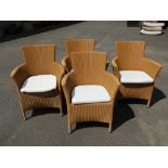 A set of four bramble crest garden furniture rush seated chairs, each with a brown plastic finish on