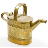A Victorian brass watering can, 26cm high.
