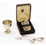 A small group of silver, to include a silver egg cup bearing initials TWH 3rd April 1952, two silver