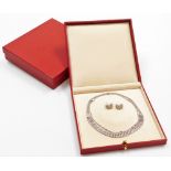 An 18ct white gold diamond necklace and earring set, the necklace of five row design each set with t