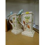 A pair of Crown Devon style hexagonal jugs, each with bluebird handle.