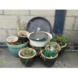 A group of garden planters, iron cauldron, enamel kitchen bowl, etc. (9)