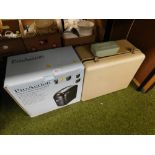 A ProAction boxed shredder, cased sewing machine and accessories. (a quantity)