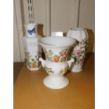 Three items of Aynsley Cottage Garden pattern china, including urnula vase, bud vase and stem vase.