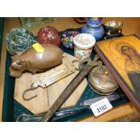 A small group of collectables, to include a print of religious icon, wooden hippo ornament, paperwei